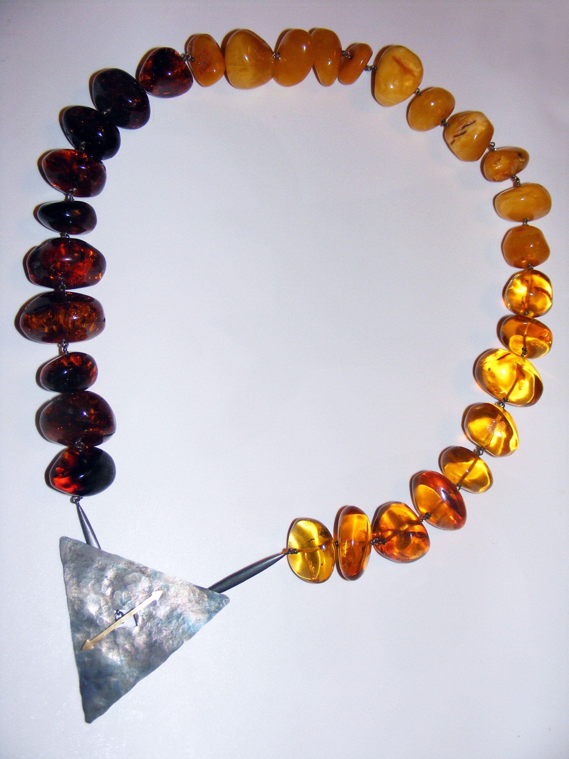 Collana di ambra con argento e oro